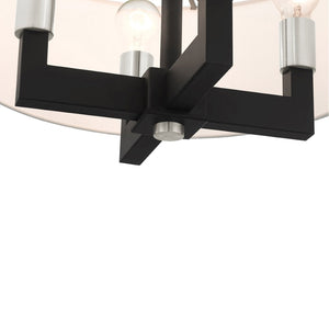 HomeRoots Black Dimmable Four-Light Chandelier with Cylinder Shades - Modern Minimalist Illumination Fixture 687504