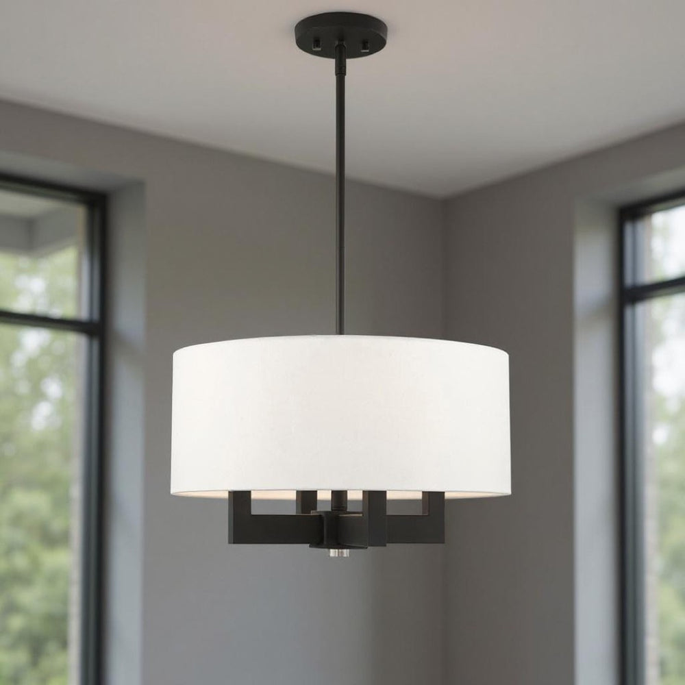 HomeRoots Black Dimmable Four-Light Chandelier with Cylinder Shades - Modern Minimalist Illumination Fixture 687504