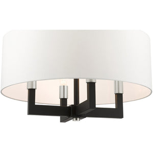 HomeRoots Black Modern Four-Light Dimmable Chandelier with Cylindrical Shades – Perfect for Any Space! 687506