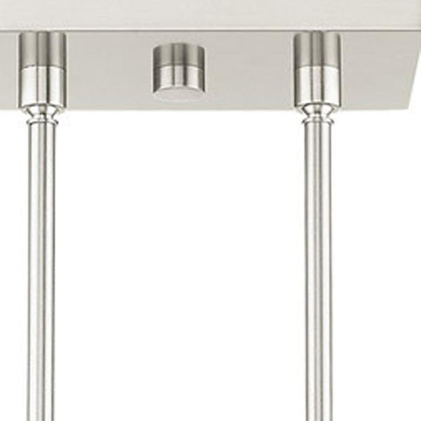 HomeRoots Four Light Dimmable Chandelier - Modern Cylinder Design with Adjustable Shades for Versatile Spaces 687513