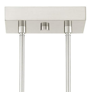 HomeRoots Four Light Dimmable Chandelier - Modern Cylinder Design with Adjustable Shades for Versatile Spaces 687513