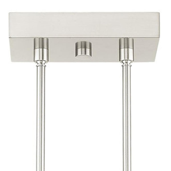 HomeRoots Four Light Dimmable Chandelier - Modern Cylinder Design with Adjustable Shades for Versatile Spaces 687513