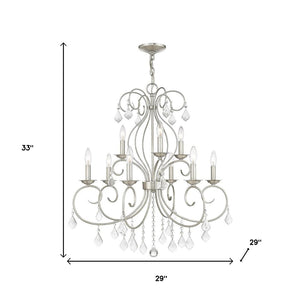 HomeRoots Nickel Nine-Light Metal Chandelier with Dimmable Function, Clear Accents & Elegant Cylinder Shades 687622