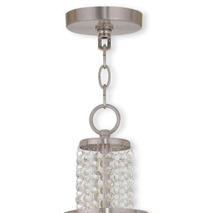 HomeRoots Nickel Three-Light Dimmable Chandelier with Cylinder Shades - Modern Elegance for Any Space 687627