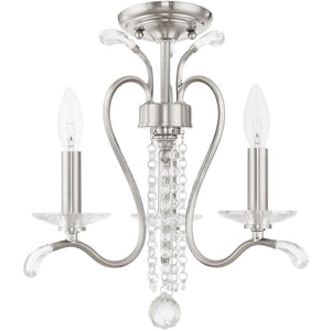 HomeRoots Nickel Dimmable Chandelier with Clear Cylinder Shades - Modern Elegance for Any Space, 3 Lights 687639