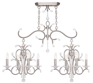HomeRoots Nickel Eight-Light Dimmable Chandelier – Modern Cylinder Design in Nickel & Clear Finish for Any Room 687646