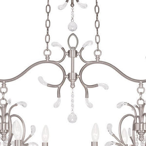 HomeRoots Nickel Eight-Light Dimmable Chandelier – Modern Cylinder Design in Nickel & Clear Finish for Any Room 687646