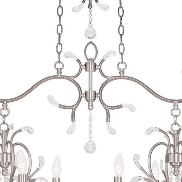 HomeRoots Nickel Eight-Light Dimmable Chandelier – Modern Cylinder Design in Nickel & Clear Finish for Any Room 687646