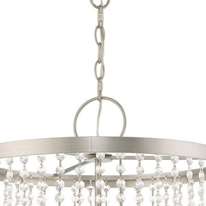 HomeRoots Four Light Dimmable Chandelier with Stylish Cylindrical Shades for Modern Ambiance & Versatility 687653