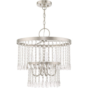 HomeRoots Four Light Dimmable Chandelier with Stylish Cylindrical Shades for Modern Ambiance & Versatility 687653