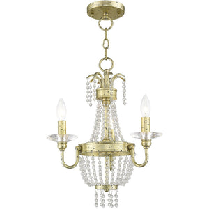HomeRoots Gold Three-Light Dimmable Chandelier with Clear Cylinder Shades – Modern Elegance for Any Space 687726