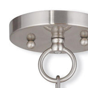 HomeRoots Four Light Dimmable Chandelier - Modern Cylinder Shades, Steel Frame, Perfect for Any Space! 687729