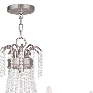 HomeRoots Nickel Six-Light Metal Chandelier with Clear Cylinder Shades – Modern Dimmable Elegance for Any Room 687733