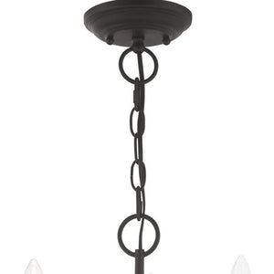 HomeRoots Black Three-Light Dimmable Chandelier with Modern Cylinder Shades for Stylish Ambient Lighting 687757