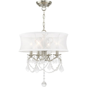 HomeRoots Four Light Dimmable Chandelier - Modern Steel Fixture with Cylinder Shades for Versatile Ambiance 687801