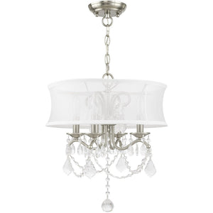 HomeRoots Four Light Dimmable Chandelier - Modern Steel Fixture with Cylinder Shades for Versatile Ambiance 687801