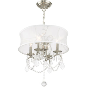 HomeRoots Four Light Dimmable Chandelier - Modern Steel Fixture with Cylinder Shades for Versatile Ambiance 687801