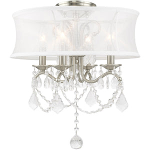 HomeRoots Four Light Dimmable Chandelier - Modern Steel Fixture with Cylinder Shades for Versatile Ambiance 687801