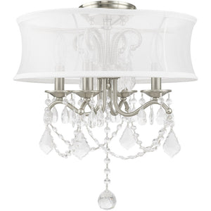 HomeRoots Four Light Dimmable Chandelier - Modern Steel Fixture with Cylinder Shades for Versatile Ambiance 687801