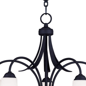 HomeRoots Black Five-Light Dimmable Chandelier - Modern Matte Finish with Cylinder Shades for Elegant Spaces 687835