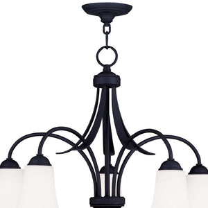 HomeRoots Black Five-Light Dimmable Chandelier - Modern Matte Finish with Cylinder Shades for Elegant Spaces 687835
