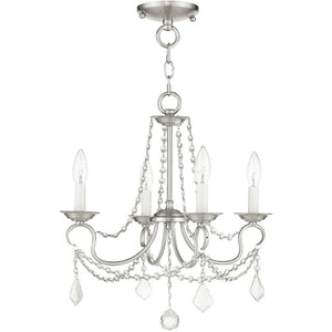 HomeRoots Nickel Four-Light Metal Dimmable Chandelier - Elegant Cylinder Design for Modern Spaces & Ambiance 687839