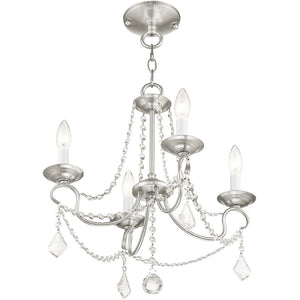HomeRoots Nickel Four-Light Metal Dimmable Chandelier - Elegant Cylinder Design for Modern Spaces & Ambiance 687839
