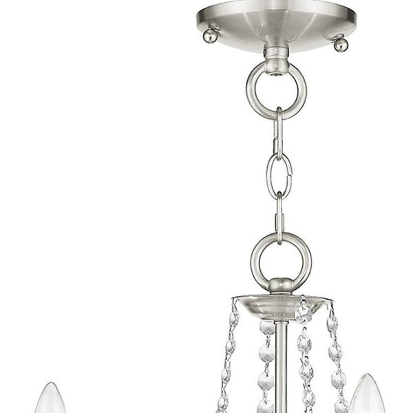 HomeRoots Nickel Four-Light Metal Dimmable Chandelier - Elegant Cylinder Design for Modern Spaces & Ambiance 687839