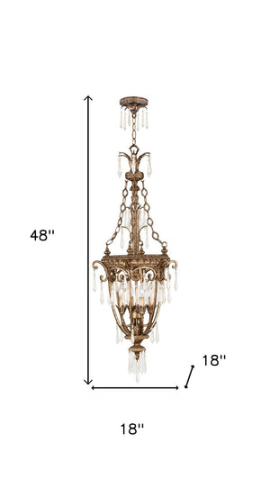 HomeRoots Gold Four-Light Dimmable Chandelier with Clear Shades – Elegant Metal Design for Modern Spaces 687893