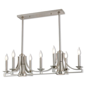 HomeRoots Nickel Nine-Light Dimmable Chandelier with Unique Cylinder Shades for Elegant Home Ambiance 687900