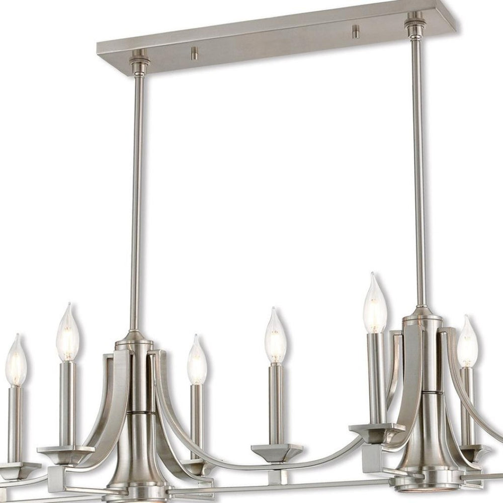 HomeRoots Nickel Nine-Light Dimmable Chandelier with Unique Cylinder Shades for Elegant Home Ambiance 687900