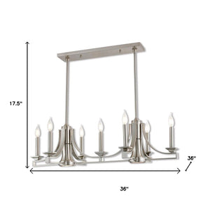HomeRoots Nickel Nine-Light Dimmable Chandelier with Unique Cylinder Shades for Elegant Home Ambiance 687900