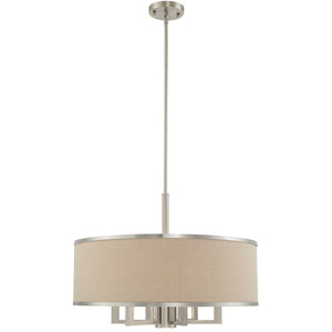 HomeRoots Seven Light Dimmable Chandelier with Sleek Cylinder Shades - Modern Steel Fixture for Any Space 687939