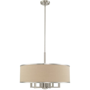 HomeRoots Seven Light Dimmable Chandelier with Sleek Cylinder Shades - Modern Steel Fixture for Any Space 687939