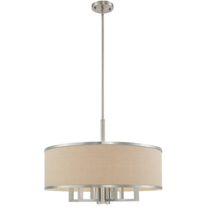 HomeRoots Seven Light Dimmable Chandelier with Sleek Cylinder Shades - Modern Steel Fixture for Any Space 687939