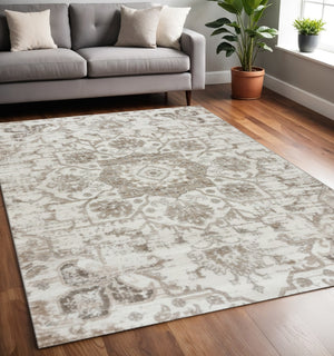 HomeRoots 5' Cream Gray and Light Brown Medallion Area Rug - Durable, Stain-Resistant Design for Busy Homes 6' X 9' 687948