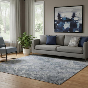 HomeRoots 5' X 8' Blue And Gray Abstract Area Rug – Washable, UV-Protected, Modern Design for Any Space! 687957