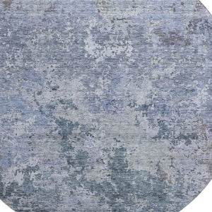 HomeRoots 8' Blue and Gray Abstract Round Rug - Washable, UV Protected, Durable for Living Rooms and Patios 687958