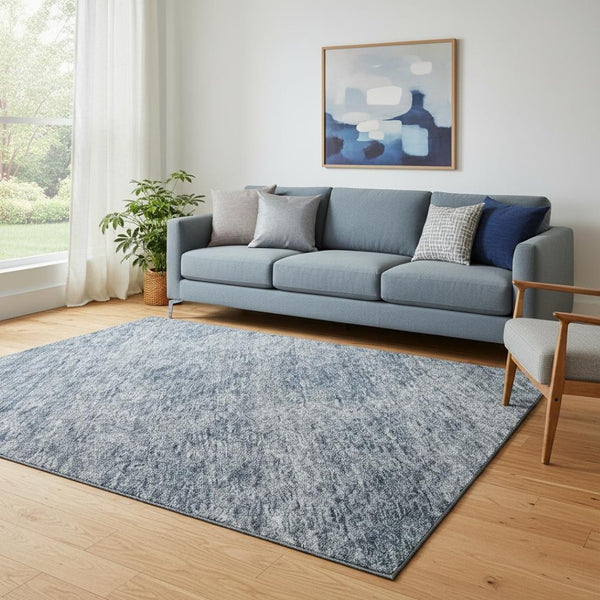 HomeRoots 5' X 8' Blue And Silver Abstract Washable Area Rug with UV Protection for High-Traffic Spaces 688089