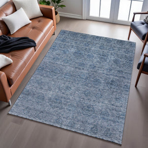 HomeRoots 5' X 8' Blue And Silver Abstract Washable Area Rug with UV Protection for High-Traffic Spaces 688089