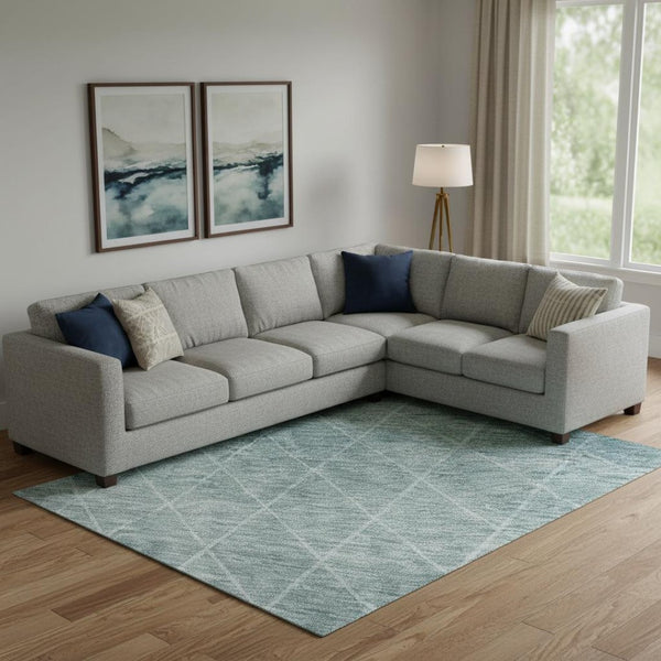 HomeRoots 10' X 14' Teal and Ivory Geometric Area Rug – Washable, UV-Protected, Durable for Modern Living Spaces 688195