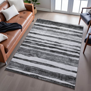 HomeRoots 10' X 14' Charcoal & Ivory Striped Washable Area Rug – Durable, UV-Protected, Ideal for High-Traffic Spaces 688261