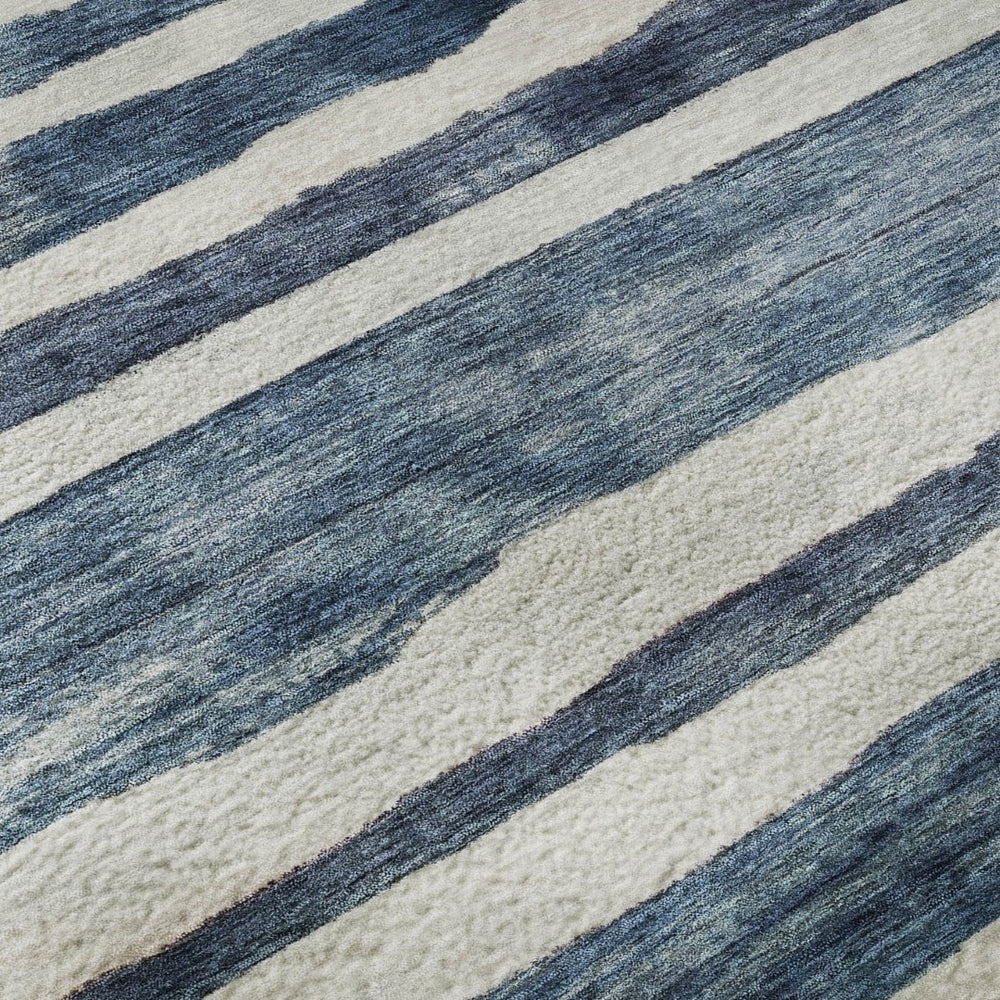 HomeRoots 8' X 10' Denim Blue & Ivory Striped Washable Area Rug with UV Protection for High-Traffic Spaces 688265