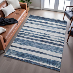 HomeRoots 8' X 10' Denim Blue & Ivory Striped Washable Area Rug with UV Protection for High-Traffic Spaces 688265