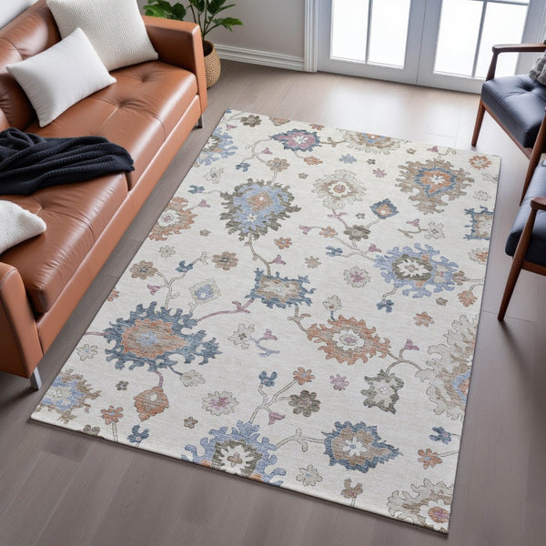 HomeRoots 9' X 12' Floral Area Rug in Ivory, Blue & Coral - Washable, UV-Protected, Stain-Resistant Design 688491
