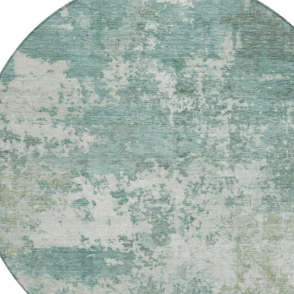 HomeRoots 8' Aqua and Ivory Round Abstract Washable Rug - Versatile Indoor/Outdoor Design for Modern Spaces 689079