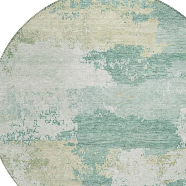 HomeRoots 8' Turquoise & Ivory Round Rug - Modern Abstract Indoor/Outdoor, Washable, Durable & Stylish Design 689415