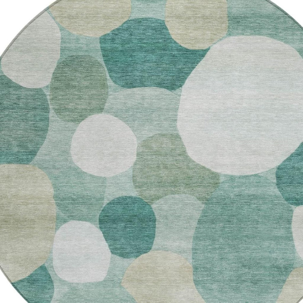 HomeRoots 8' Teal Blue & Ivory Round Geometric Rug - Stylish, Washable Design for Indoor & Outdoor Spaces! 689567