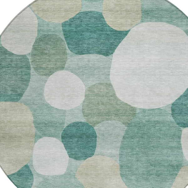 HomeRoots 8' Teal Blue & Ivory Round Geometric Rug - Stylish, Washable Design for Indoor & Outdoor Spaces! 689567