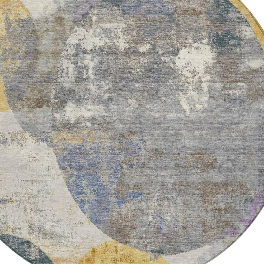 HomeRoots 8' Modern Gray Gold and Ivory Round Geometric Washable Area Rug for Indoor and Outdoor Spaces 689801